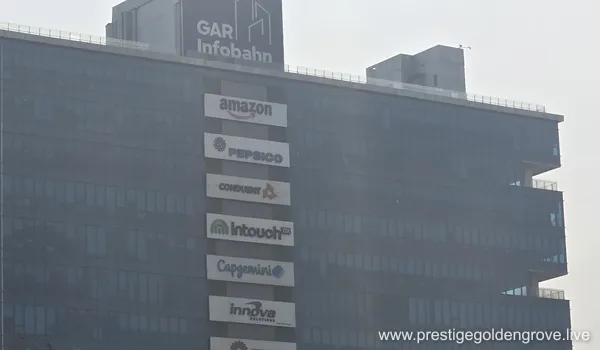 The GAR Infobahn Tower 3 building located near Prestige Golden Grove, housing global companies including Amazon, PepsiCo, Conduent, IntouchCX, and Capgemini.